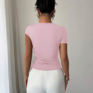 Elenzga Top à manches courtes pour femmes avec encolure asymétrique élégante, décoré de boutons en métal or rose 3D