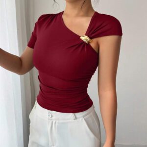 Elenzga Top à manches courtes pour femmes avec encolure asymétrique élégante, décoré de boutons en métal or rose 3D