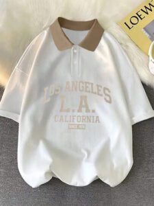 Manfinity Sporsity Chemise polo d'été vintage décontractée ample à manches courtes, col décontracté, avec imprimé graphique de lettres pour hommes