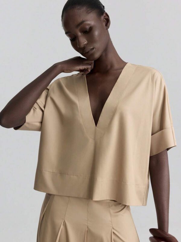 Ontre Tenue décontractée de haute qualité pour femmes d'affaires, comprenant un ensemble deux pièces ample et confortable : un Top à manches dolman col V et une jupe cintrée à la taille avec design de bordure contrastée, convenant pour le bureau, les déplacements et les voyages – Image 3