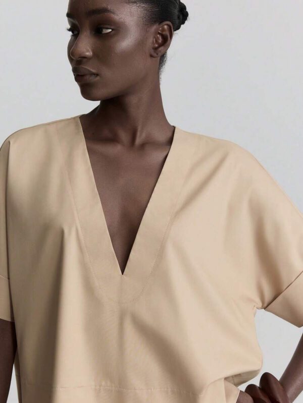 Ontre Tenue décontractée de haute qualité pour femmes d'affaires, comprenant un ensemble deux pièces ample et confortable : un Top à manches dolman col V et une jupe cintrée à la taille avec design de bordure contrastée, convenant pour le bureau, les déplacements et les voyages – Image 4