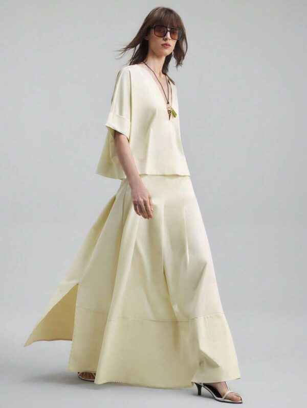 Ontre Tenue décontractée de haute qualité pour femmes d'affaires, comprenant un ensemble deux pièces ample et confortable : un Top à manches dolman col V et une jupe cintrée à la taille avec design de bordure contrastée, convenant pour le bureau, les déplacements et les voyages – Image 15
