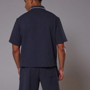 Musero Chemise polo à manches courtes surdimensionnée avec poche brodée "Musero" seulement