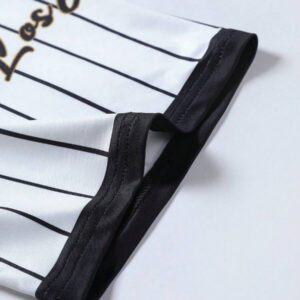 Manfinity Streetrush Polo style streetwear à coupe ample avec imprimé lettres et rayures pour jeunes hommes