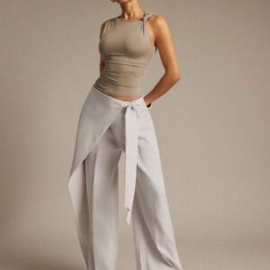 Hauture Blouse ajustée sans manches à la mode avec design de boutons de couleur unie pour femmes