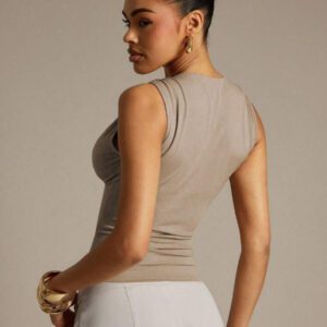 Hauture Blouse ajustée sans manches à la mode avec design de boutons de couleur unie pour femmes