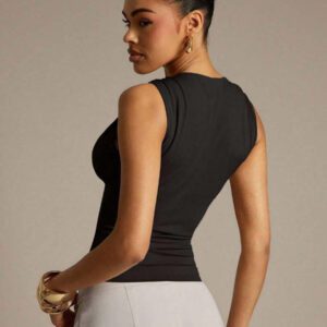 Hauture Blouse ajustée sans manches à la mode avec design de boutons de couleur unie pour femmes
