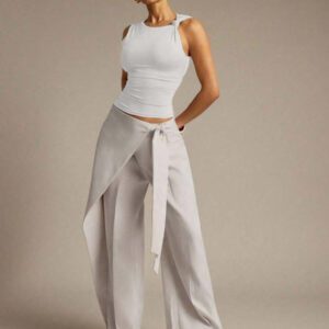 Hauture Blouse ajustée sans manches à la mode avec design de boutons de couleur unie pour femmes