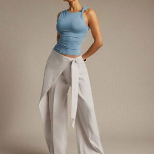 Hauture Blouse ajustée sans manches à la mode avec design de boutons de couleur unie pour femmes