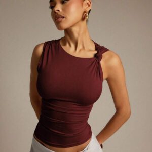 Hauture Blouse ajustée sans manches à la mode avec design de boutons de couleur unie pour femmes