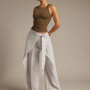 Hauture Blouse ajustée sans manches à la mode avec design de boutons de couleur unie pour femmes
