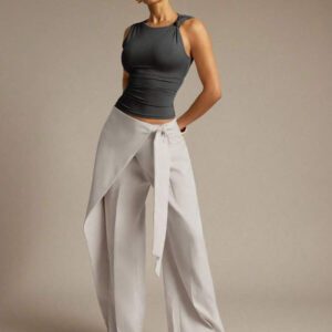 Hauture Blouse ajustée sans manches à la mode avec design de boutons de couleur unie pour femmes