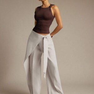 Hauture Blouse ajustée sans manches à la mode avec design de boutons de couleur unie pour femmes