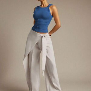 Hauture Blouse ajustée sans manches à la mode avec design de boutons de couleur unie pour femmes