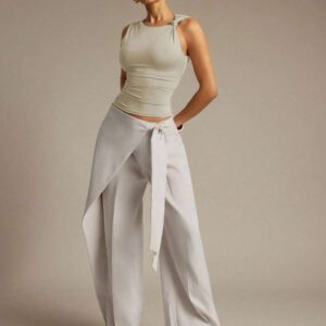 Hauture Blouse ajustée sans manches à la mode avec design de boutons de couleur unie pour femmes