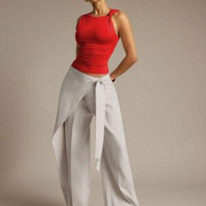 Hauture Blouse ajustée sans manches à la mode avec design de boutons de couleur unie pour femmes