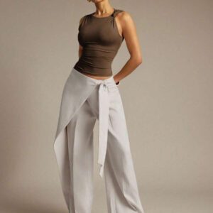 Hauture Blouse ajustée sans manches à la mode avec design de boutons de couleur unie pour femmes