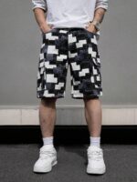 Manfinity LEGND Short en jean patchwork imprimé avec poches rabattables pour hommes. Short en jean ample, blocs de couleurs, style urbain, idéal pour les sorties, les vacances et les occasions décontractées. Style Emo. – Image 7